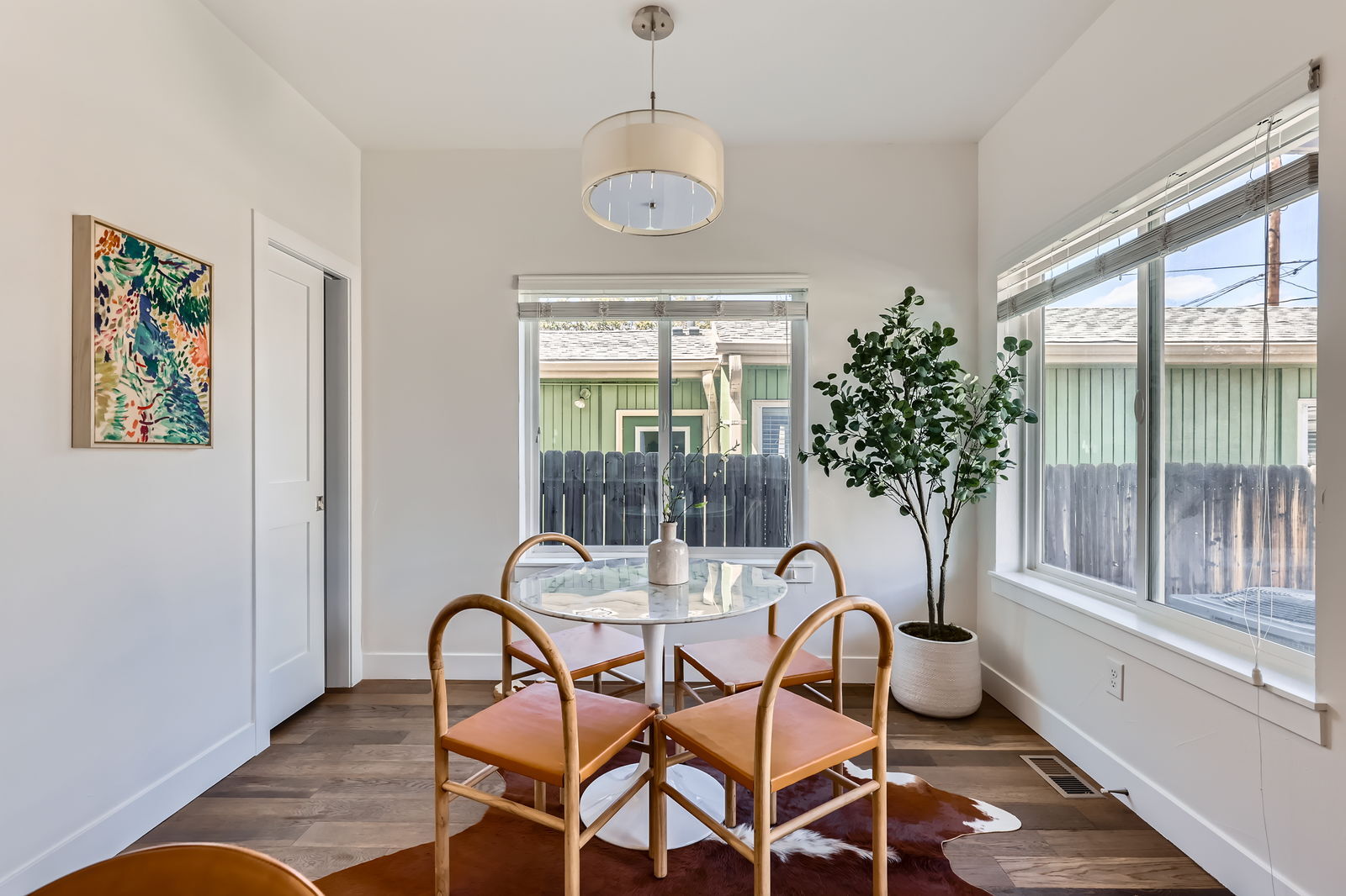 Staged dining area at 3640 Lipan St, Denver CO